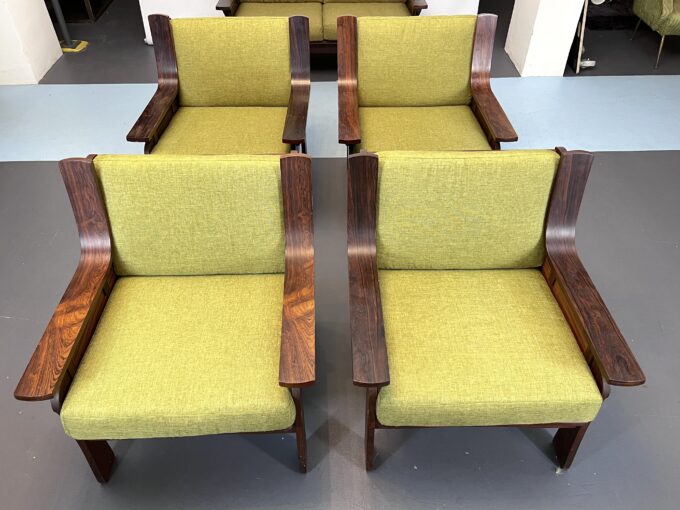 Mid-Century Set of four armchairs and a sofa in wood and green fabric. Italy 1960s