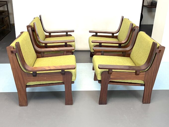 Mid-Century Set of four armchairs and a sofa in wood and green fabric. Italy 1960s