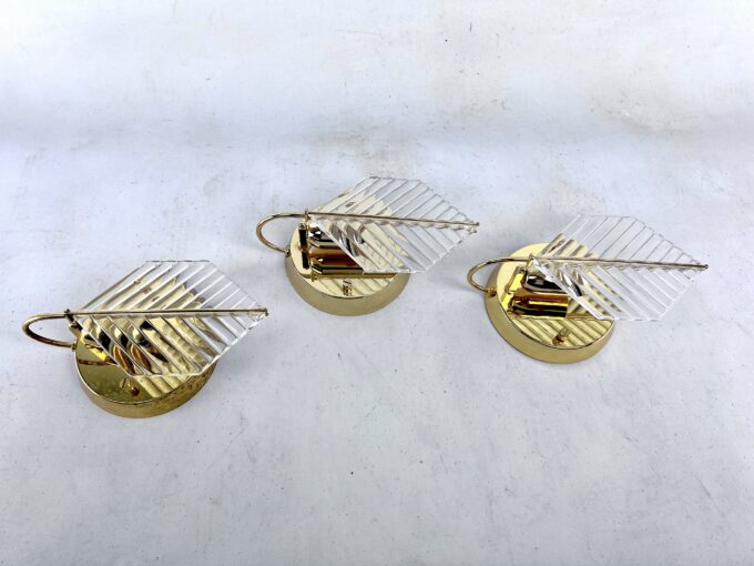 Vintage set of three sconces in brass and glass by Zero Quattro. Italy 1970s