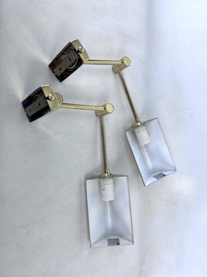 Postmodern pair of articulated brass wall lamps by Baulmann Leuchten. Germany 1980s