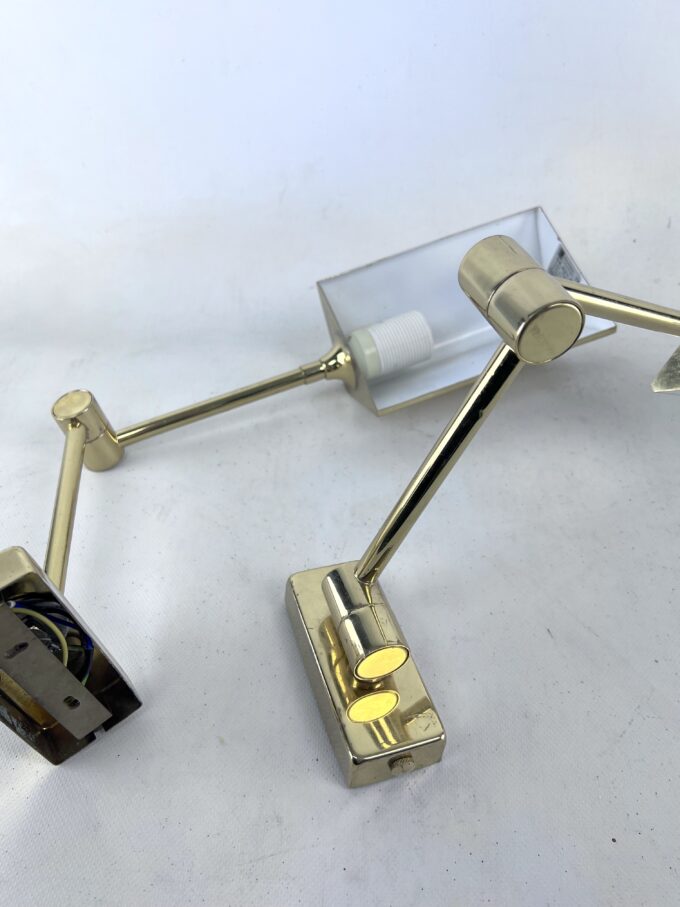 Postmodern pair of articulated brass wall lamps by Baulmann Leuchten. Germany 1980s