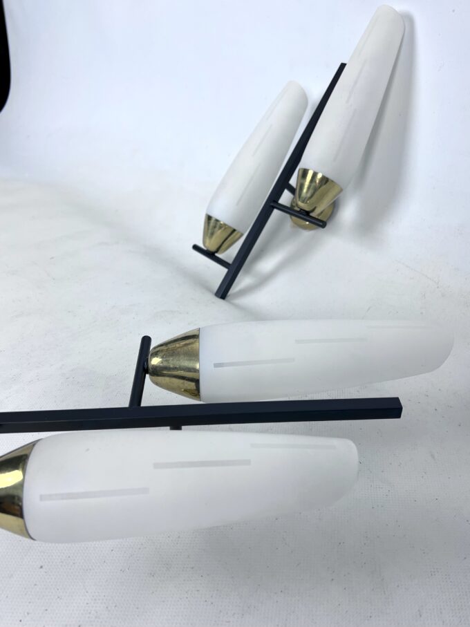 Mid-Century pair of double lights sconces in brass and opaline glass. Italy 1950s