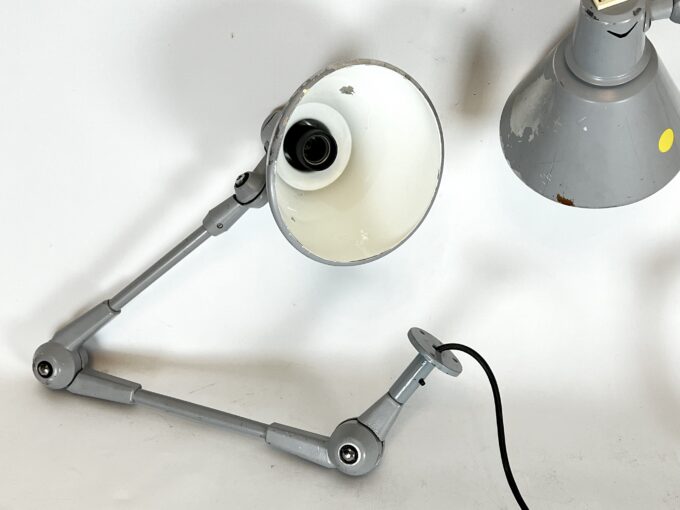 Mid-Century Stilnovo, set of two rare wall lamps in metal. Italy 1960s