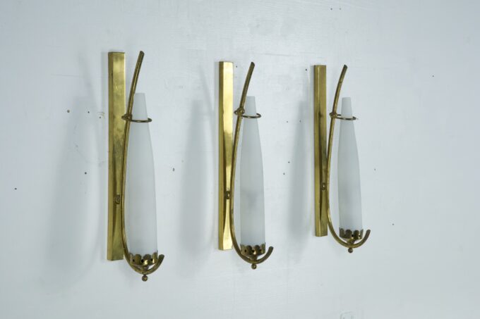 Set of three sconces in brass and triplex opaline glass in Arredoluce manner. Italy 1950s