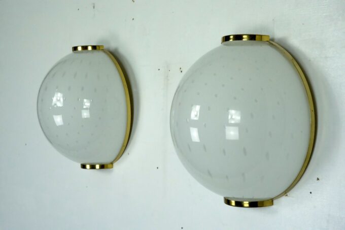Pair of large round murano bullicante glass sconces with brass. Italy 1970s