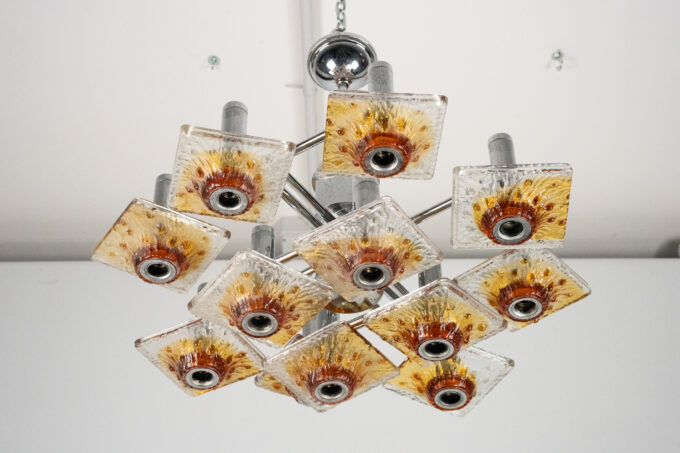 12-light Mazzega chandelier in amber and clear murano glass and chrome. Italy 1970s