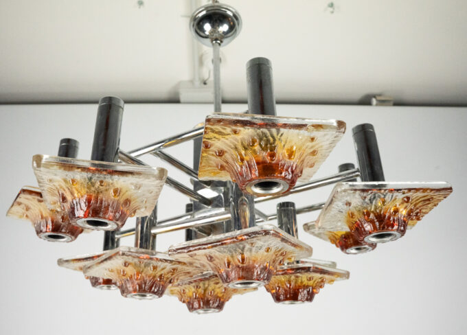 12-light Mazzega chandelier in amber and clear murano glass and chrome. Italy 1970s