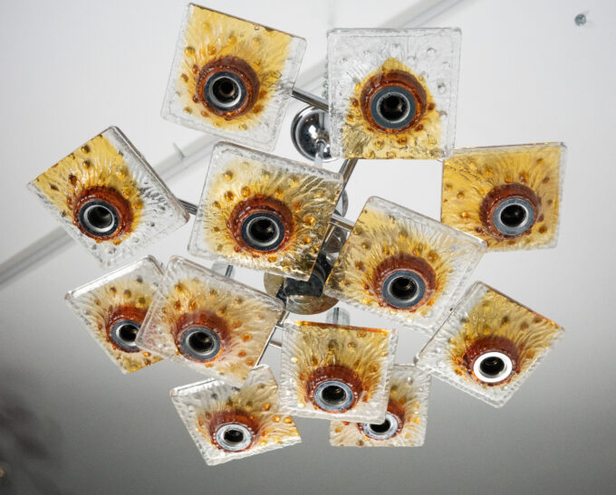 12-light Mazzega chandelier in amber and clear murano glass and chrome. Italy 1970s